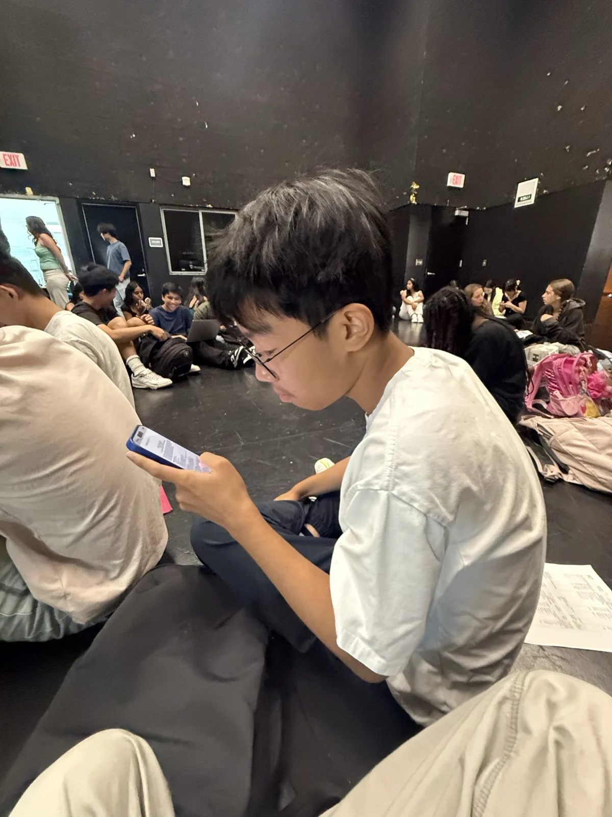 Sitting with friends indoors