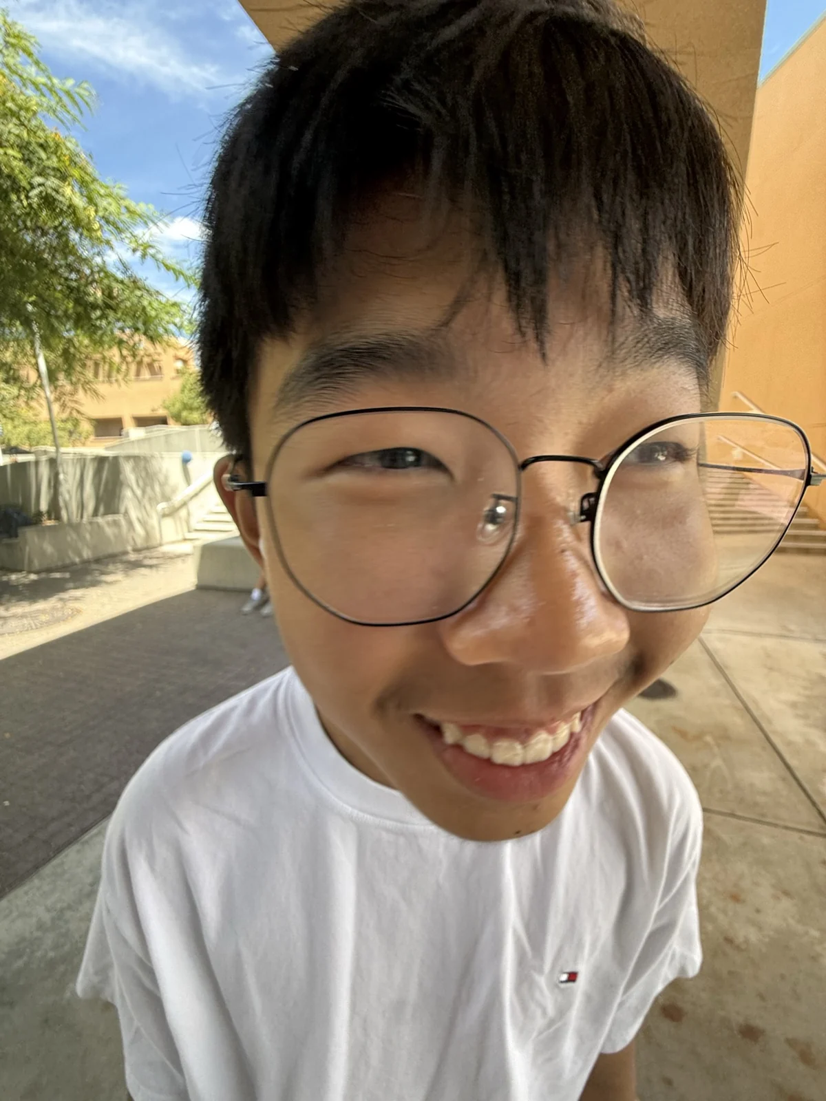 A smiling close-up outside