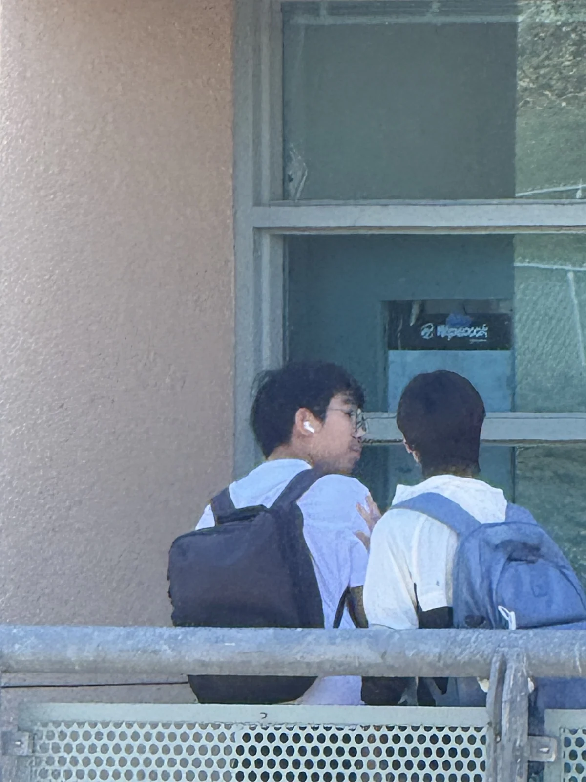Looking back while walking with a friend